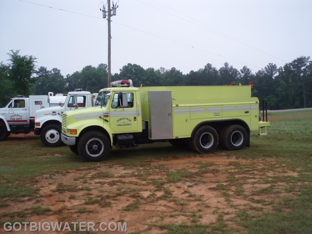 Shelby FD Tanker 113 - built from a retired power company boom/bucket truck.
