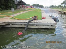 The pump supplied water to the 3000-gal dump tank using 300-ft of 5-inch LDH.