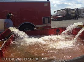 Thirteen tankers hauled water over a 10-mile roundtrip to support this rural water supply drill.