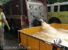 Maiden Tanker 1 jet-dumping its first load of water.