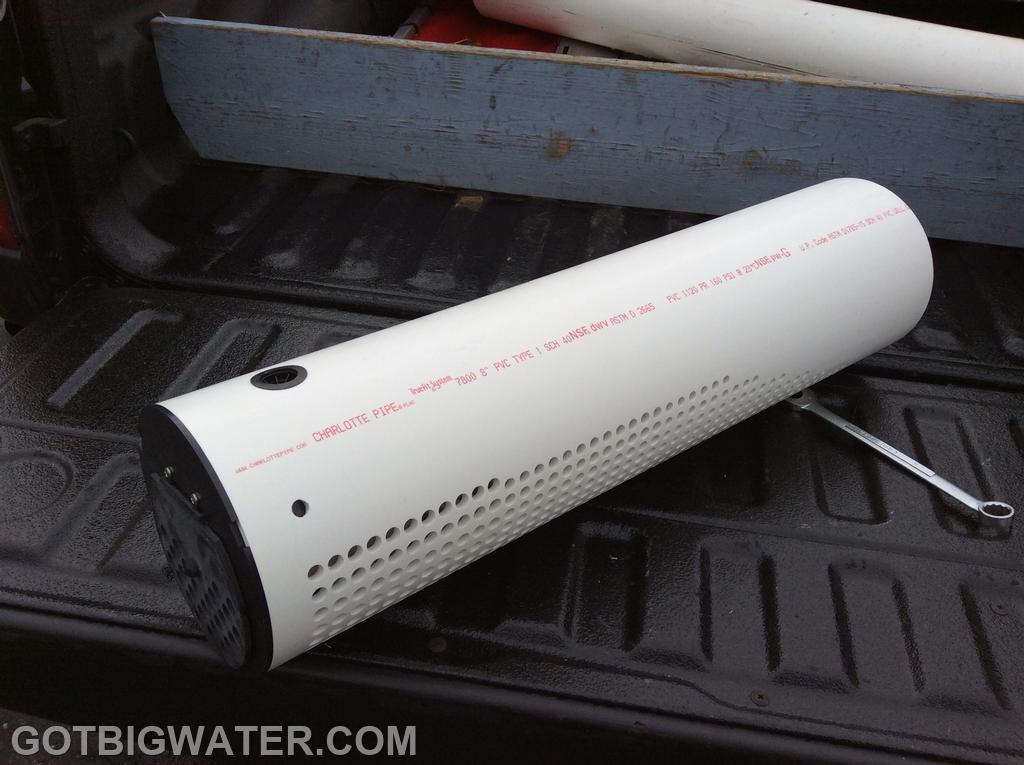 The non-perforated side of the strainer serves as a version of a vortex breaker.