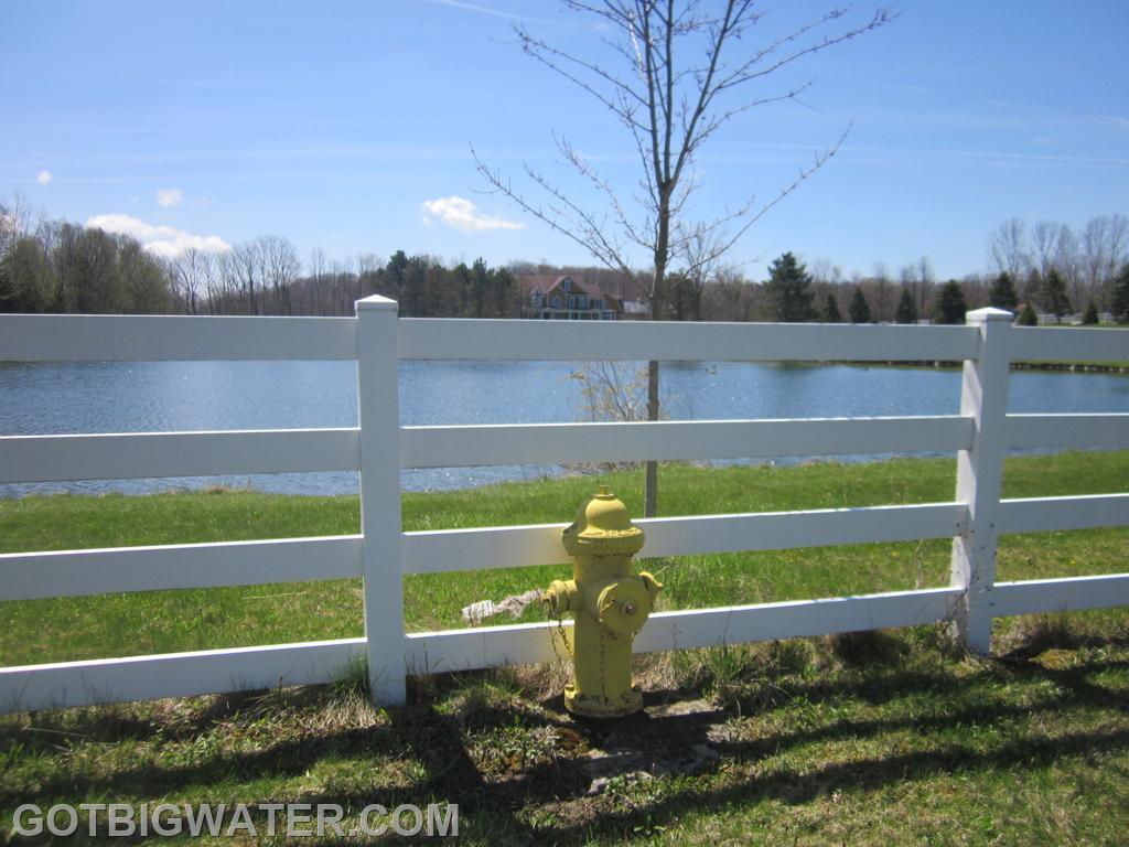 This dry barrel tradition-style fire hydrant is actually a dry fire hydrant (with valve) that provides FD access to this large pond.