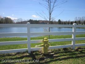 This dry barrel tradition-style fire hydrant is actually a dry fire hydrant (with valve) that provides FD access to this large pond.