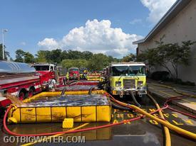 Three pumpers and eight dump tanks were used to reach the peak flow of 3,000 gpm during the second half of the 2-hour drill.