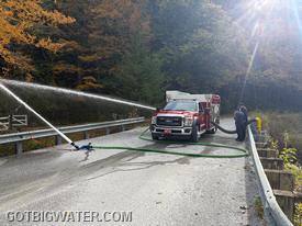Engine 2 (1250 gpm) drafts and flows 800 gpm during the installation flow test.